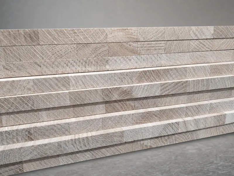 Close-up of stacked oak panel edges and clean end grain